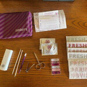 Jamberry nail set with wraps, nail care tools, and heat dryer